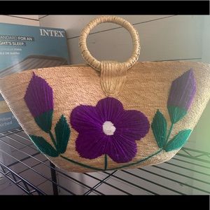 Handmade handbag from Mexico with embroidered purple flowers